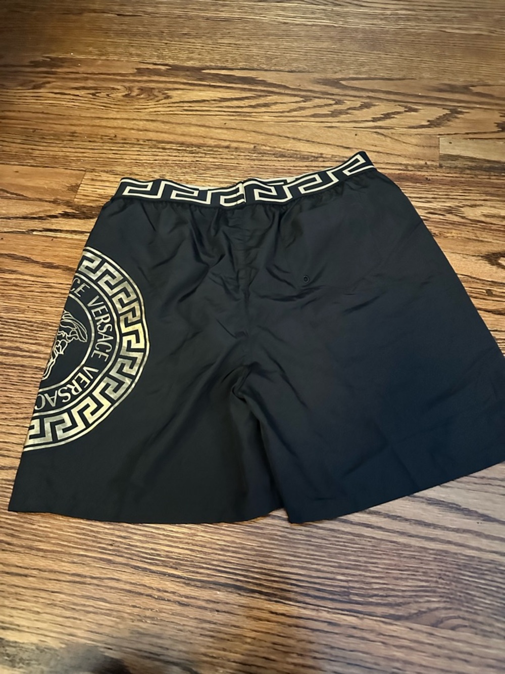 Versace Black Swim Shorts with Gold Medusa Emblem